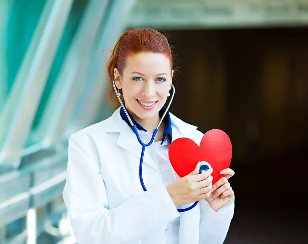 Doctor listening to heart